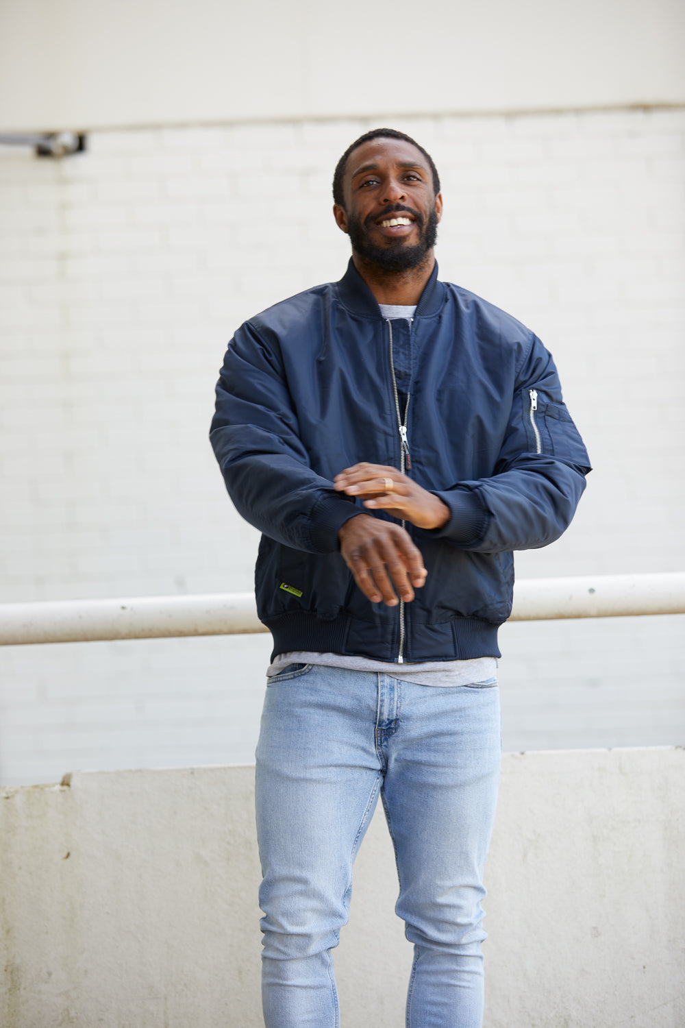 Blue and on sale black bomber jacket