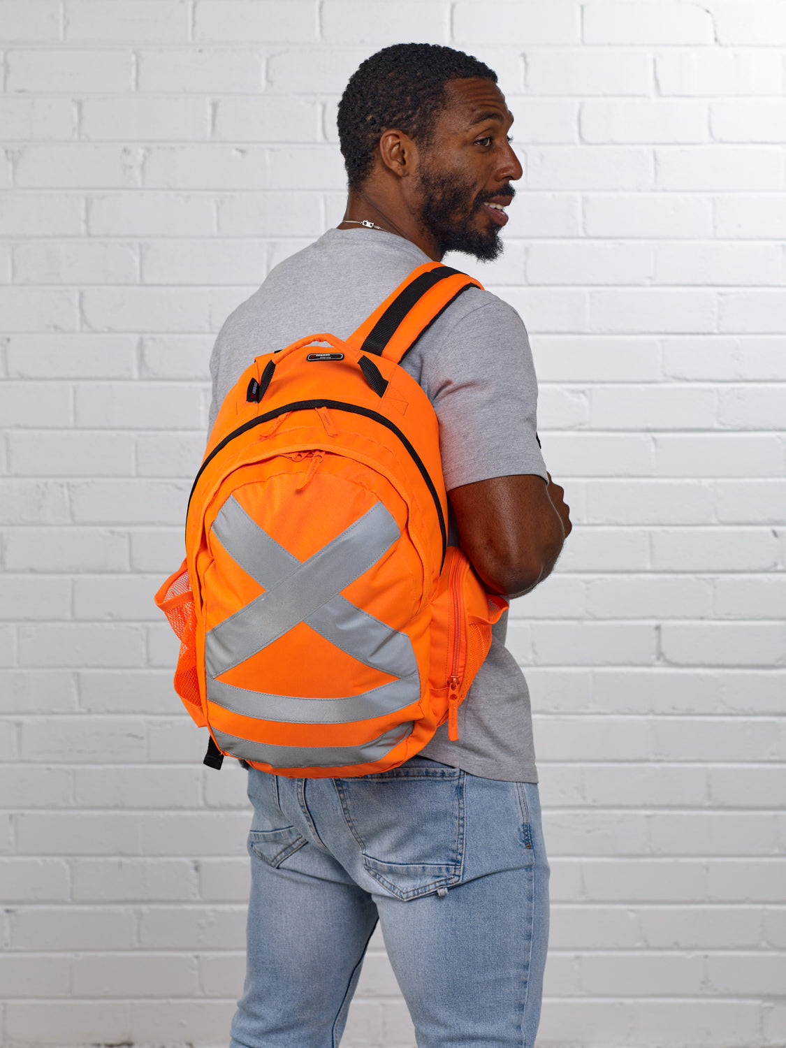Caribee Calibre Safety backpack Orange - model studio